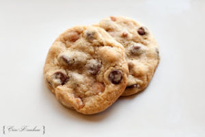 two chocolate chip cookies on top of one another