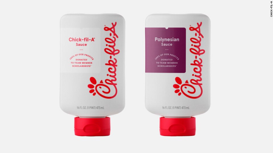 two bottles of chick-fil-a sauce standing next to each other against a white background