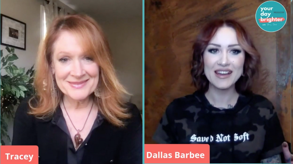 Tracey and Dallas side by side on a video call tracey wearing black v neck shirt sitting in front of a green leafy tree and Dallas wearing a tie dye black shirt that reads Saved Not Soft as she sits in front of a brown wooden wall