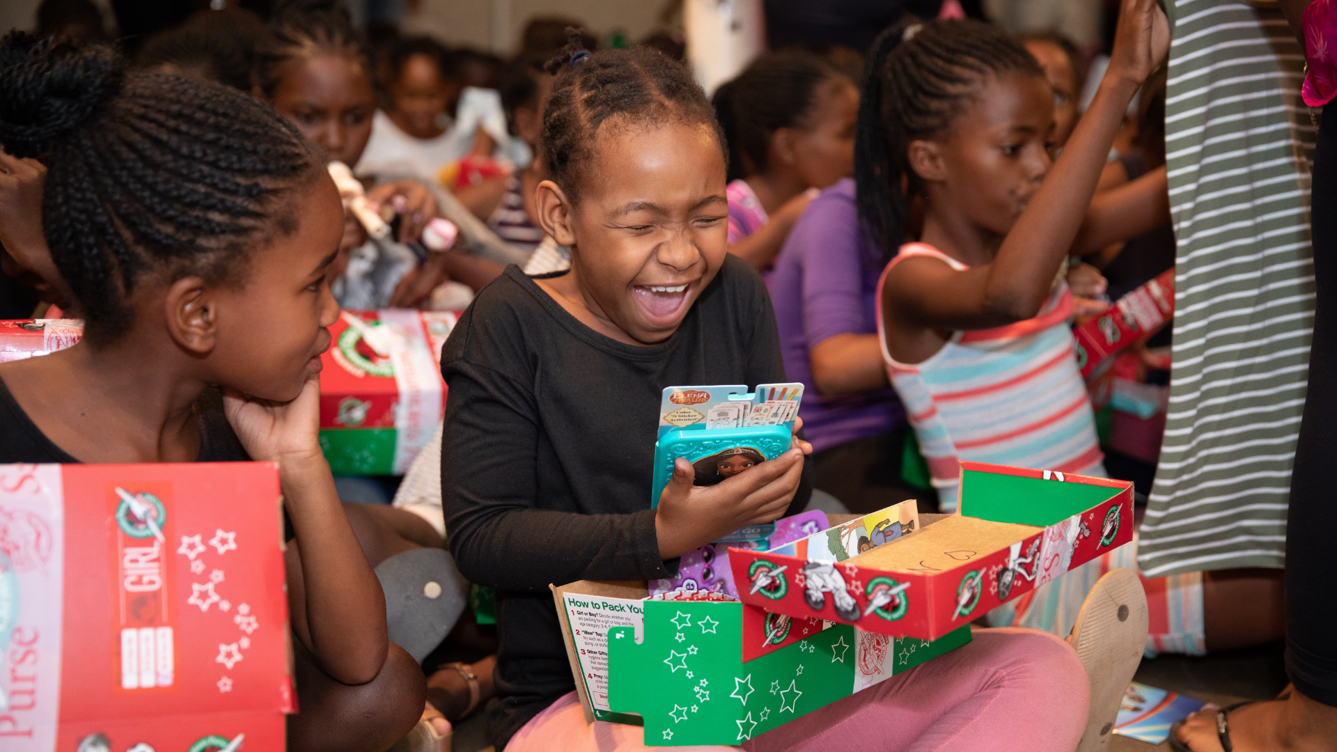 Sheer joy overwhelms a girl in the African nation of Namibia as she opens her gift-filled shoebox.
