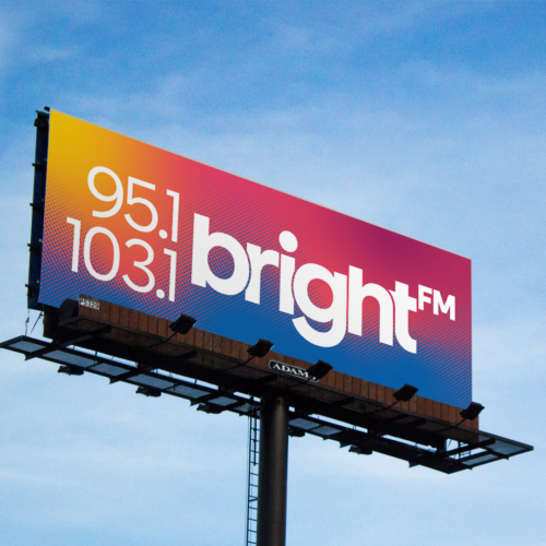 BRIGHT-FM billboard, showing 95.1 and 103.1, displayed against a blue sky