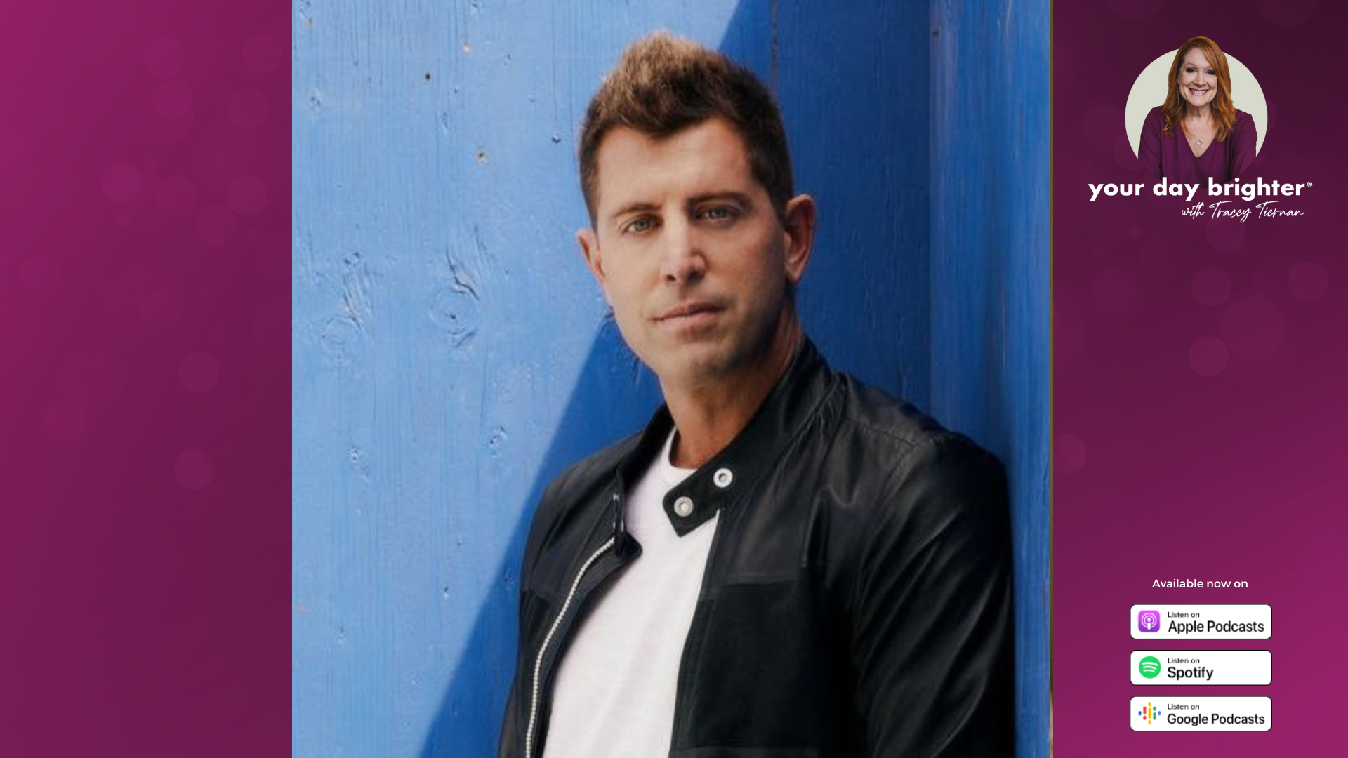 Jeremy Camp in a leather jacket and a white t-shirt posing against a blue wall