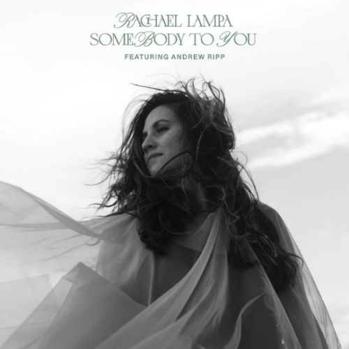 Cover art for "Somebody To You" by Rachael Lampa. Image shows Rachael Lampa in a black and white photo looking to the side as her tulle dress blows in the wind